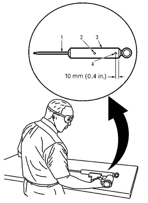Fig. 12: Drilling Hole In Shock Absorber At Centerpunched Locations